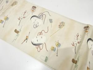 能面に小道具模様織り出し　袋帯